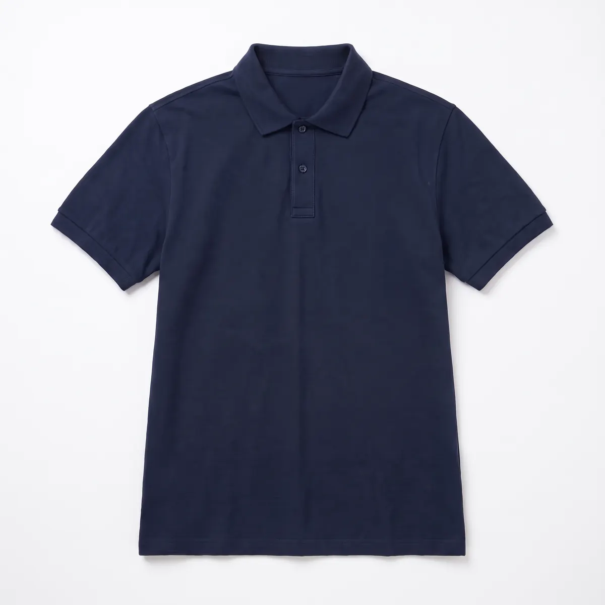 Navy jersey polo shown blank, then with white ORVENNE embroidery. The mark is a fictional sample.