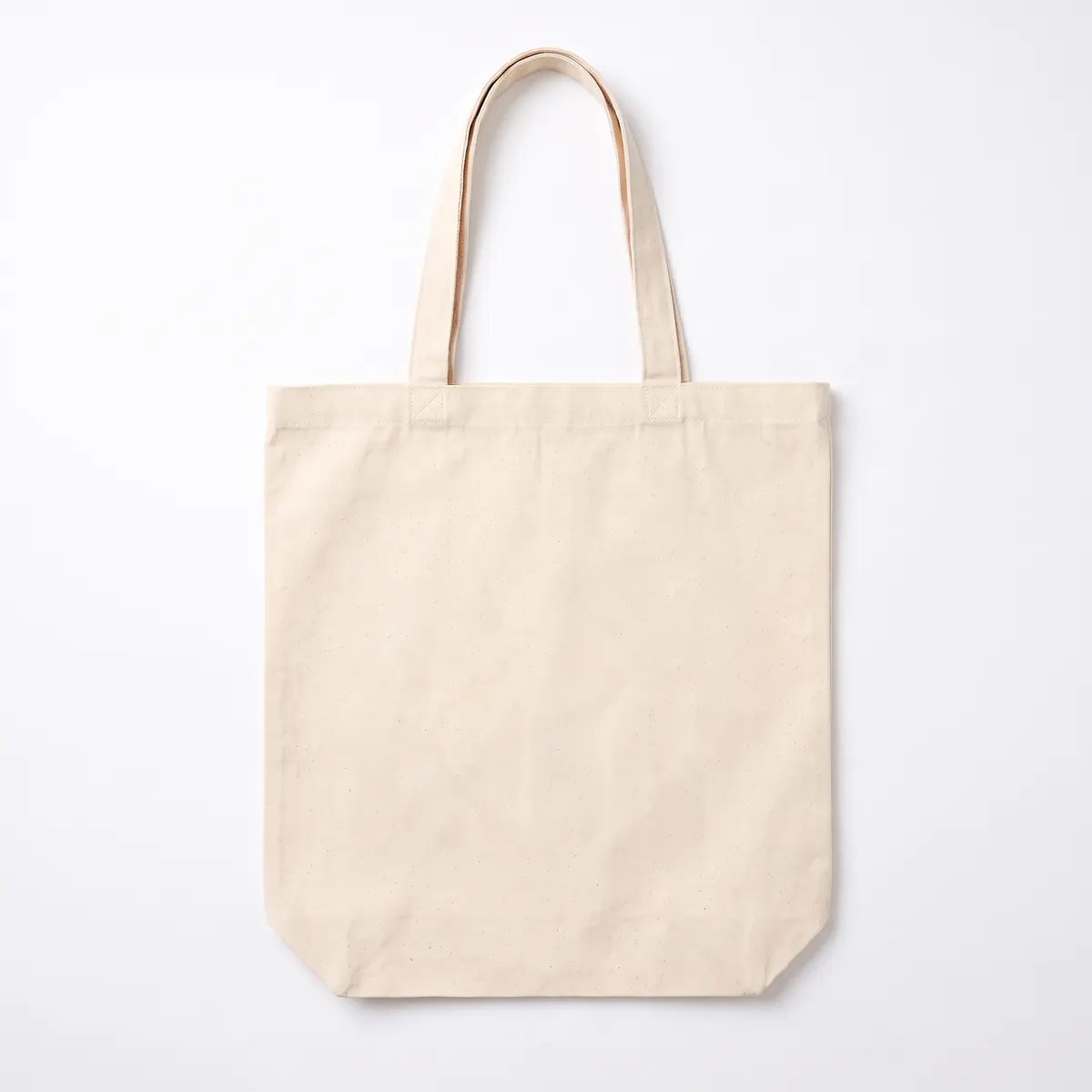 Natural canvas tote shown blank, then with a black TESSARO COFFEE CO. print. The mark is a fictional sample.